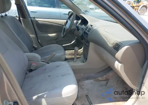 1998 Toyota Corolla Ve из США, поврежденный, VIN 2T1BR12E7WC031063